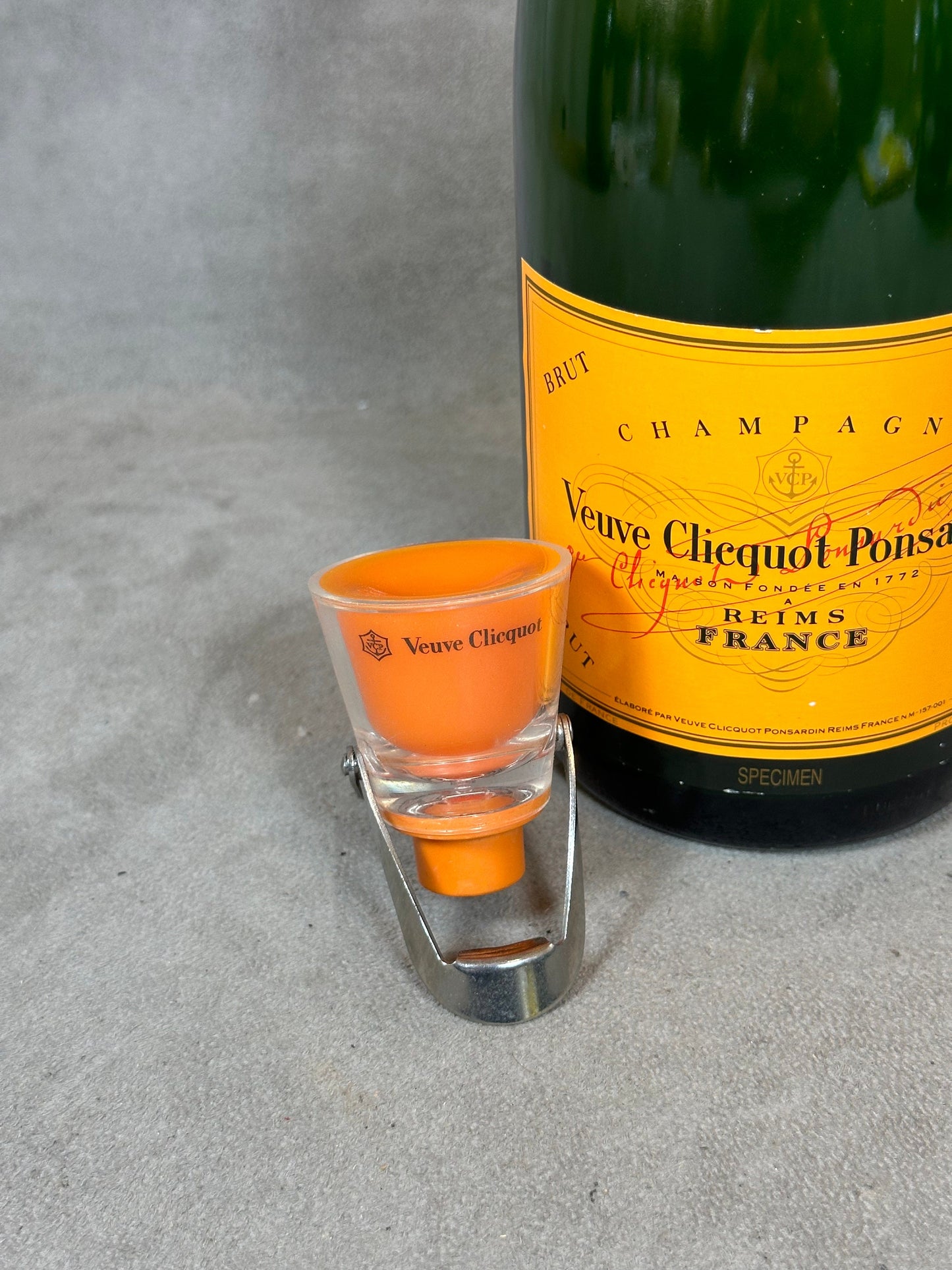 Trendy line stopper for opened bottles of Veuve Cliquot Ponsardin champagne