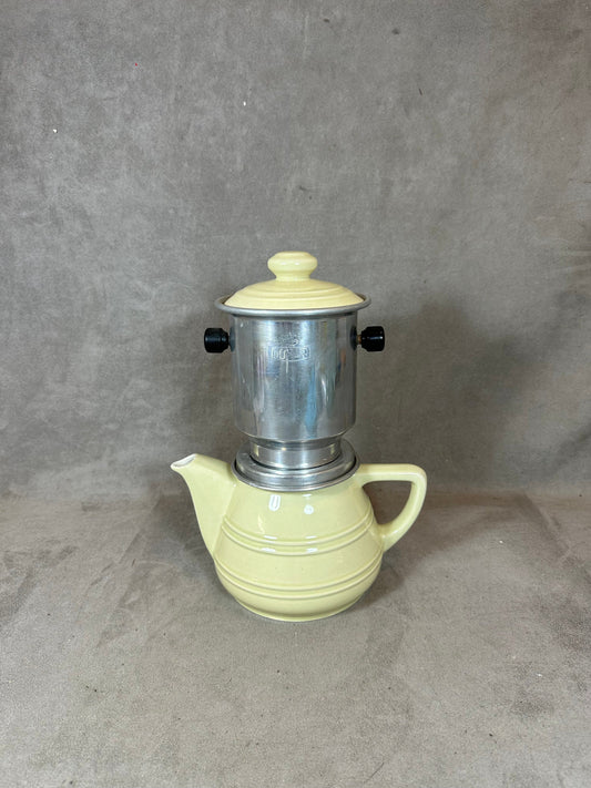 RARE NOMAR silver filter coffee maker on vintage yellow earthenware with details from the 1960s