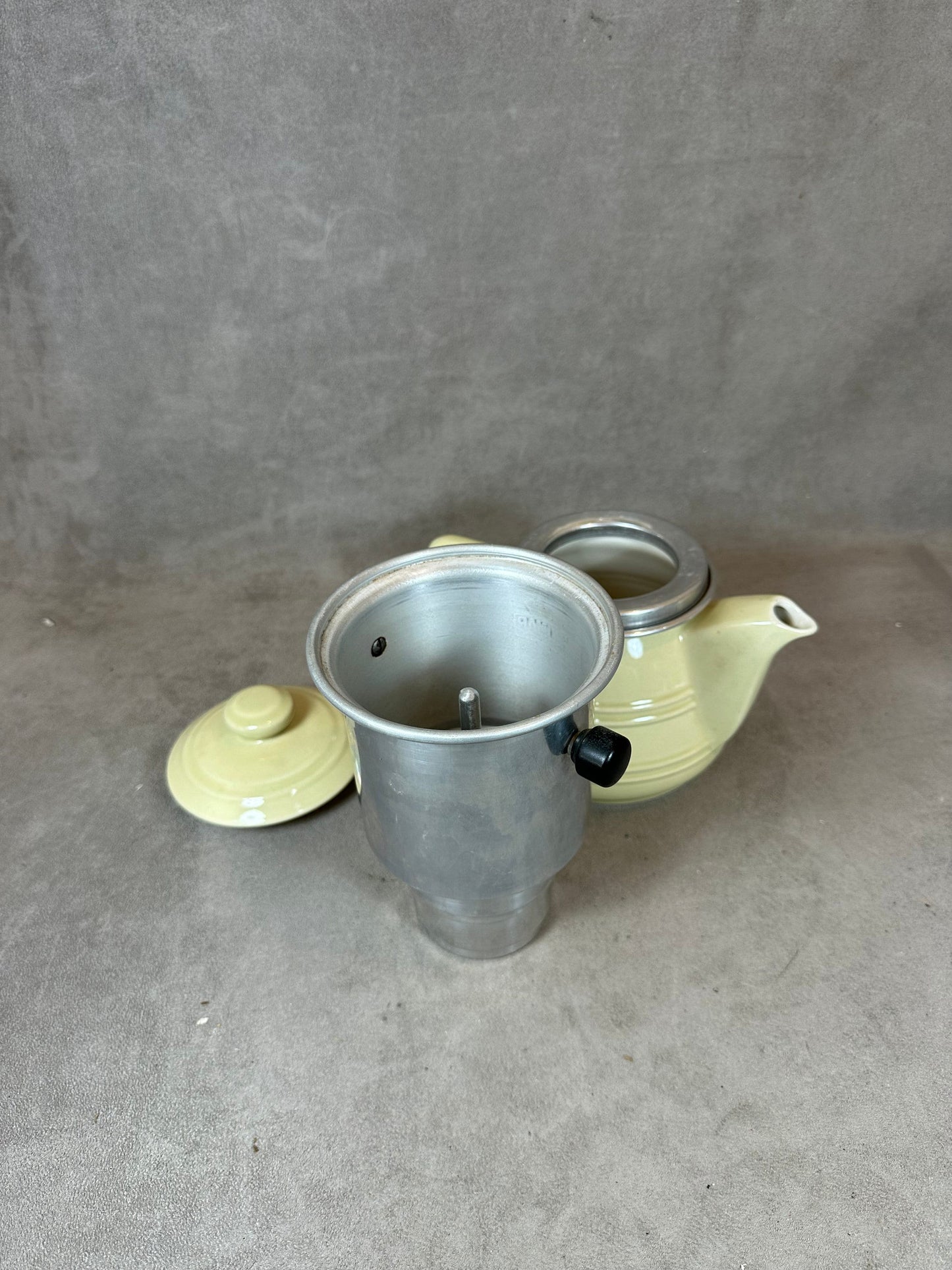 RARE NOMAR silver filter coffee maker on vintage yellow earthenware with details from the 1960s