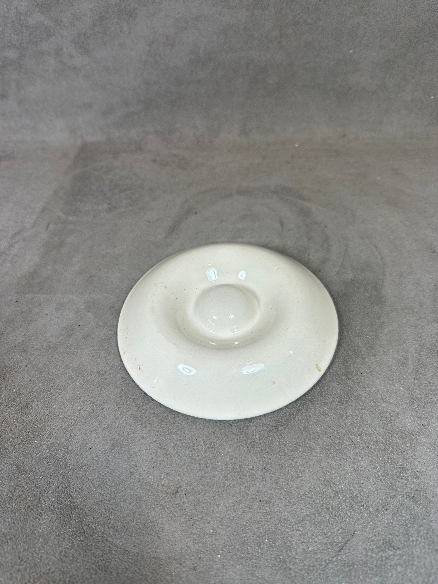 Antique earthenware egg cup with foliage decoration from the 1960s