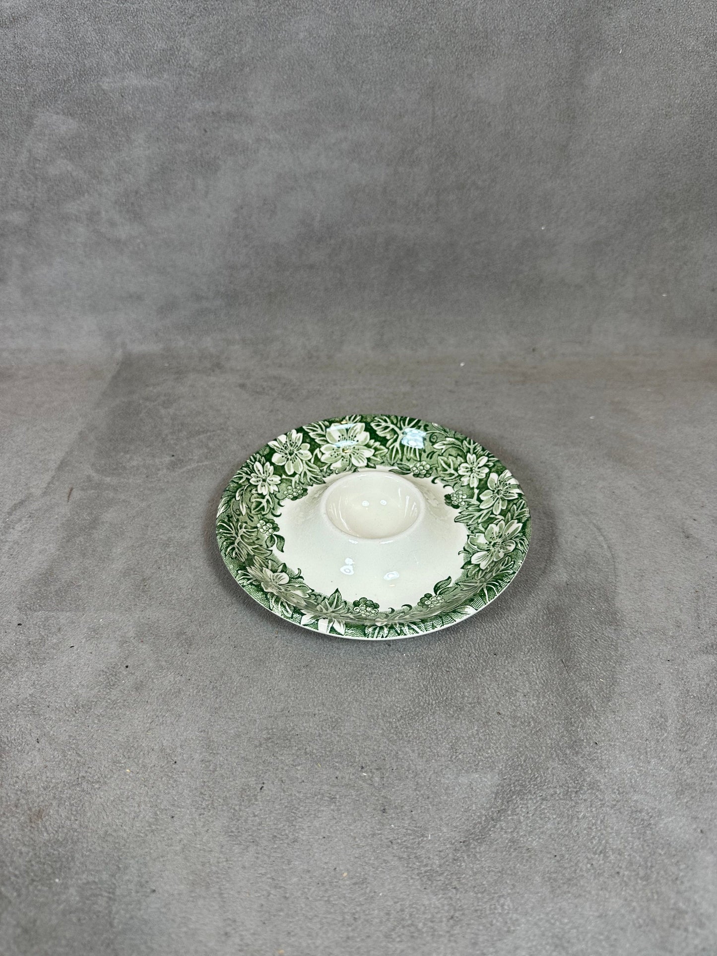 Antique earthenware egg cup with foliage decoration from the 1960s