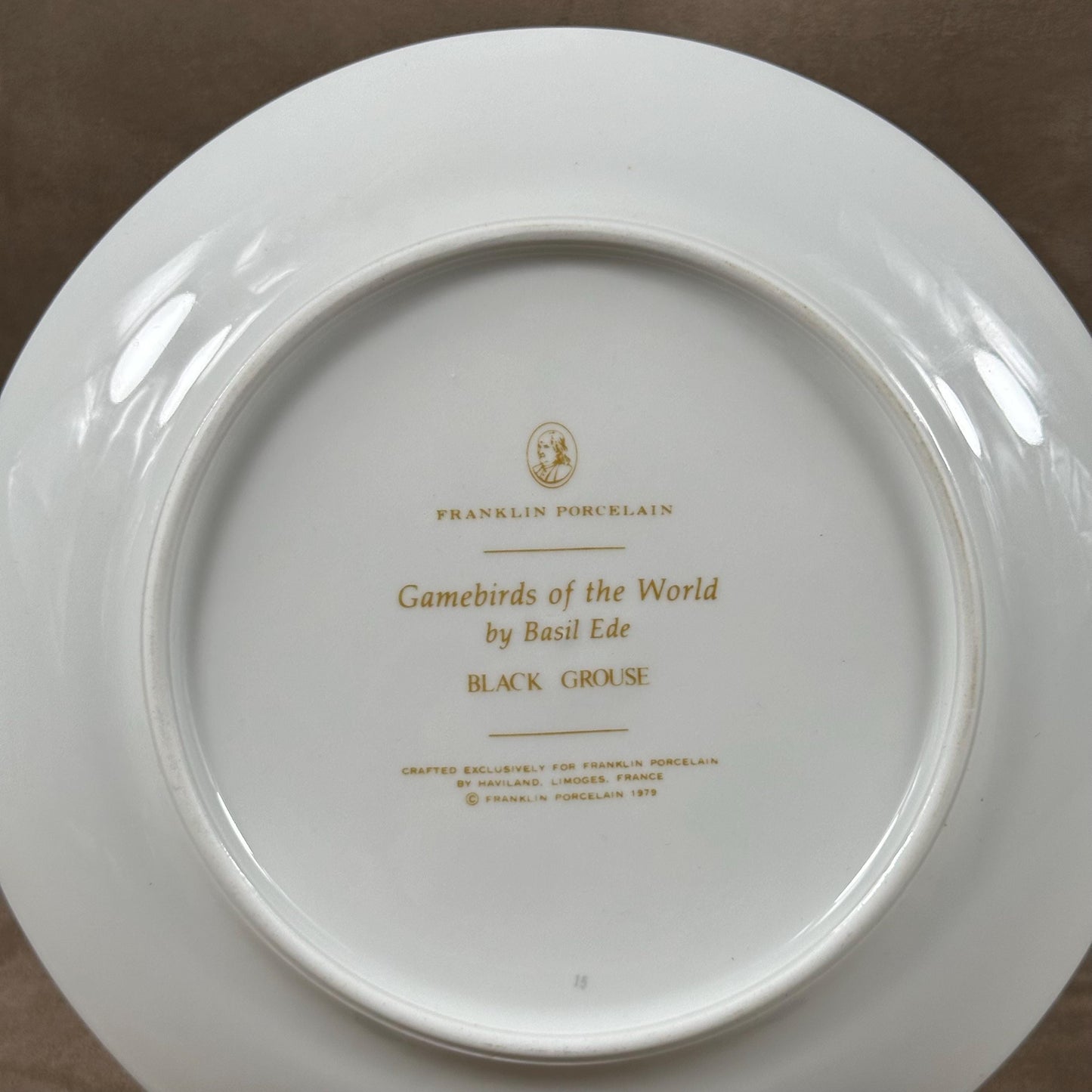 Beautiful decorative plate "Gamebird of the World" by Basil Ede made by Haviland in Limoges porcelain for Franklin Porcelain 1979