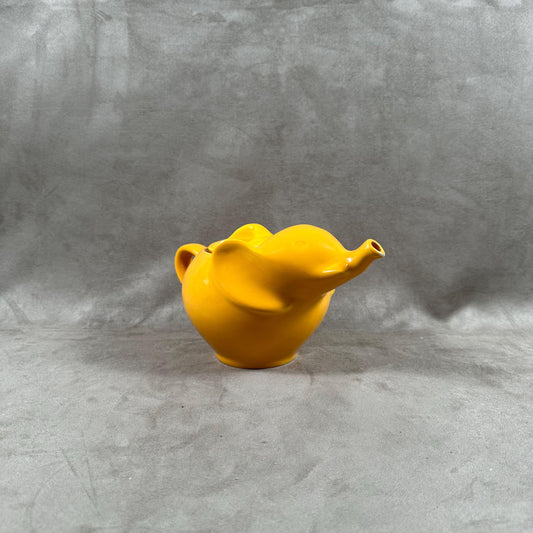 Beautiful orange ceramic teapot in the shape of an elephant Made in France