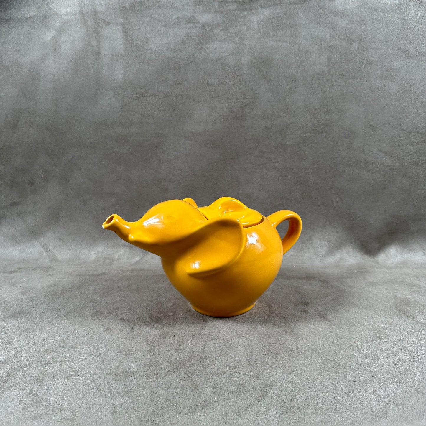 Beautiful orange ceramic teapot in the shape of an elephant Made in France