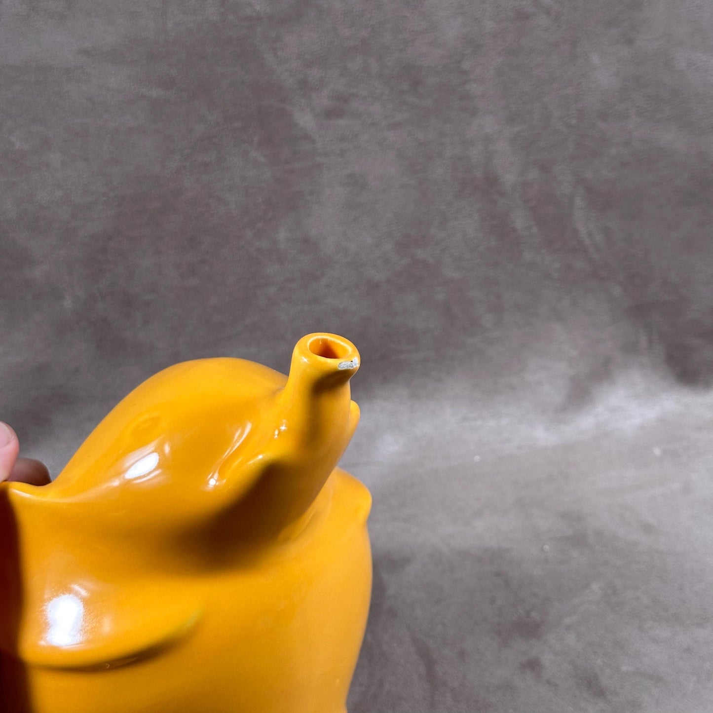 Beautiful orange ceramic teapot in the shape of an elephant Made in France