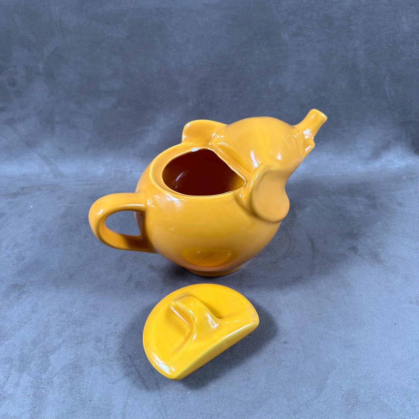 Beautiful orange ceramic teapot in the shape of an elephant Made in France