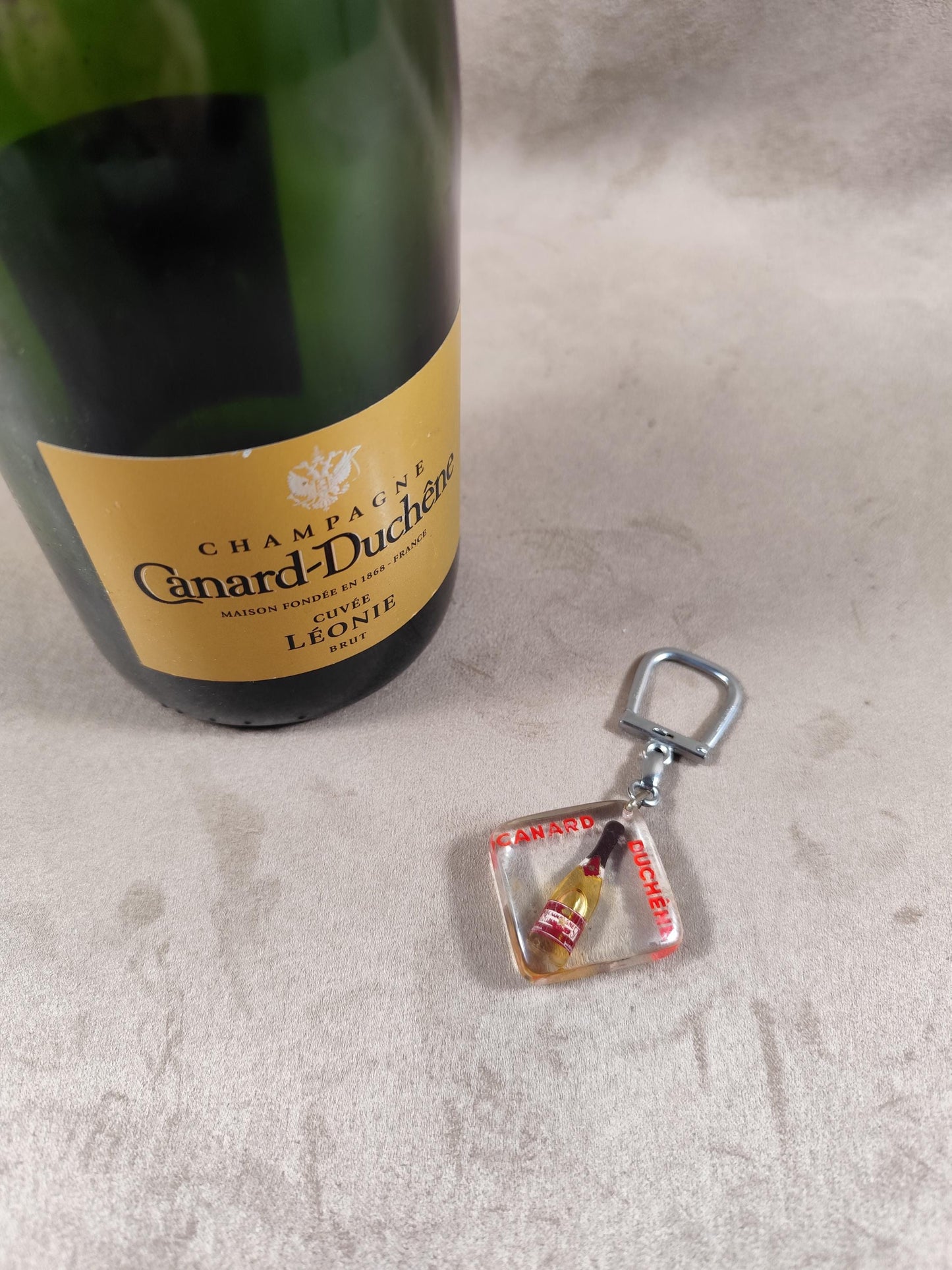 Porte clés Bourbon à bulle Champagne Canard Duchêne Made in France Vintage 1970