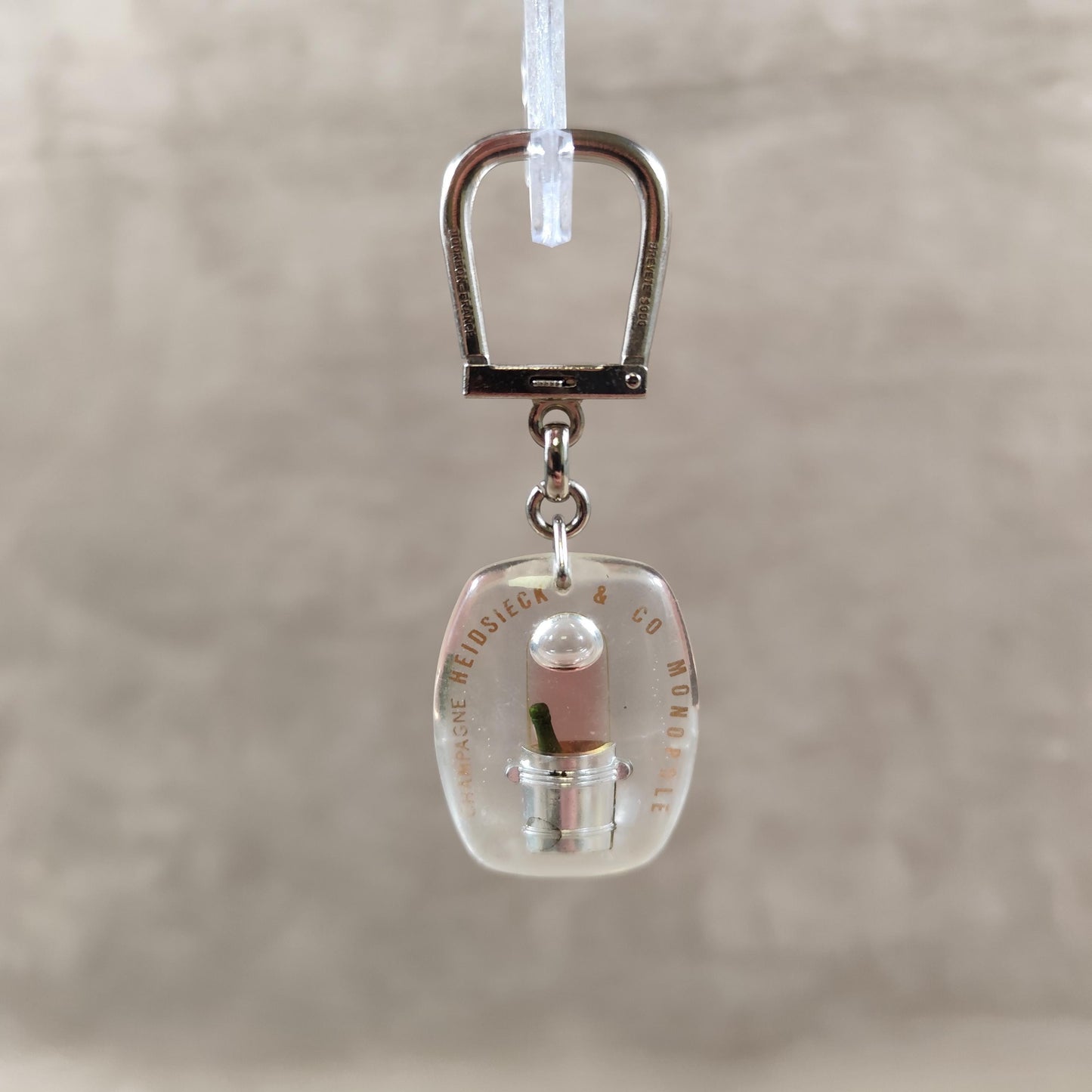Porte clés Bourbon à bulle Champagne Heidsieck Monopole Made in France Vintage 1970