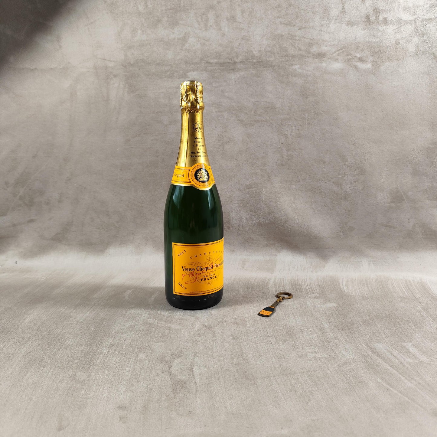 Porte clés Veuve Clicquot en acier Made in France Années 1980