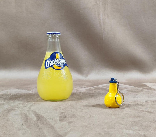 Porte clés Publicitaire en forme de bouteille Orangina en plastique Made in France Vintage 1980