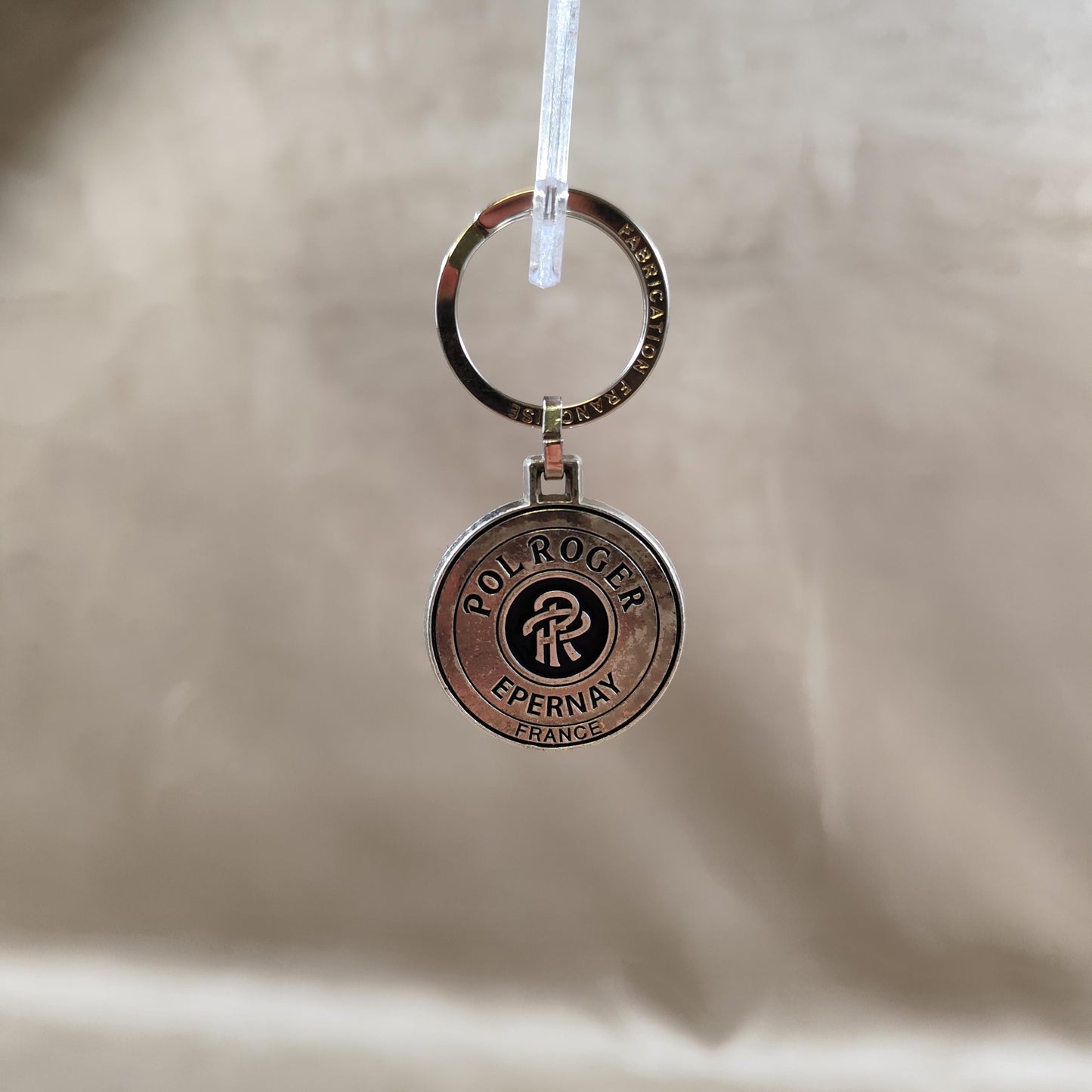 Porte clés Pol Roger en acier Made in France Années 1980