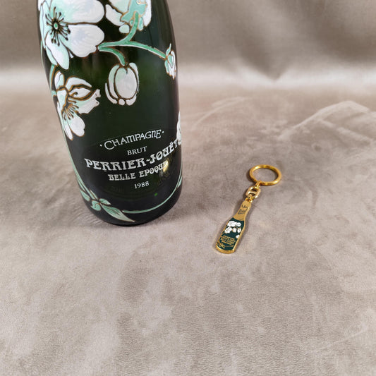 RARE Porte-clés Perrier Jouet en métal à décor de bouteille de champagne Made in France Vintage 1960