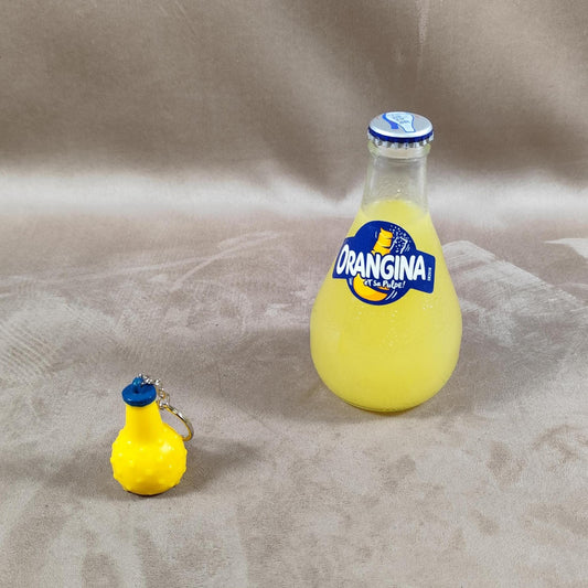 Porte clés Publicitaire en forme de bouteille Orangina en plastique Made in France Vintage 1980