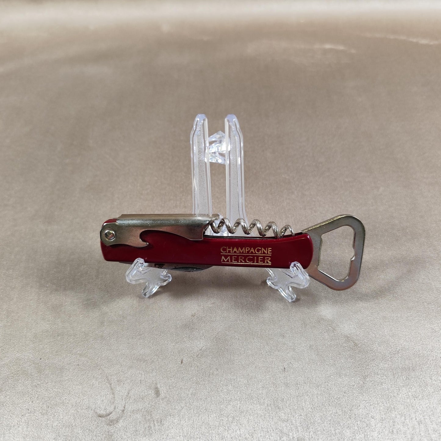 Décapsuleur, Tire-bouchon Champagne Mercier en acier et plastique rouge Made in France Vintage 1970