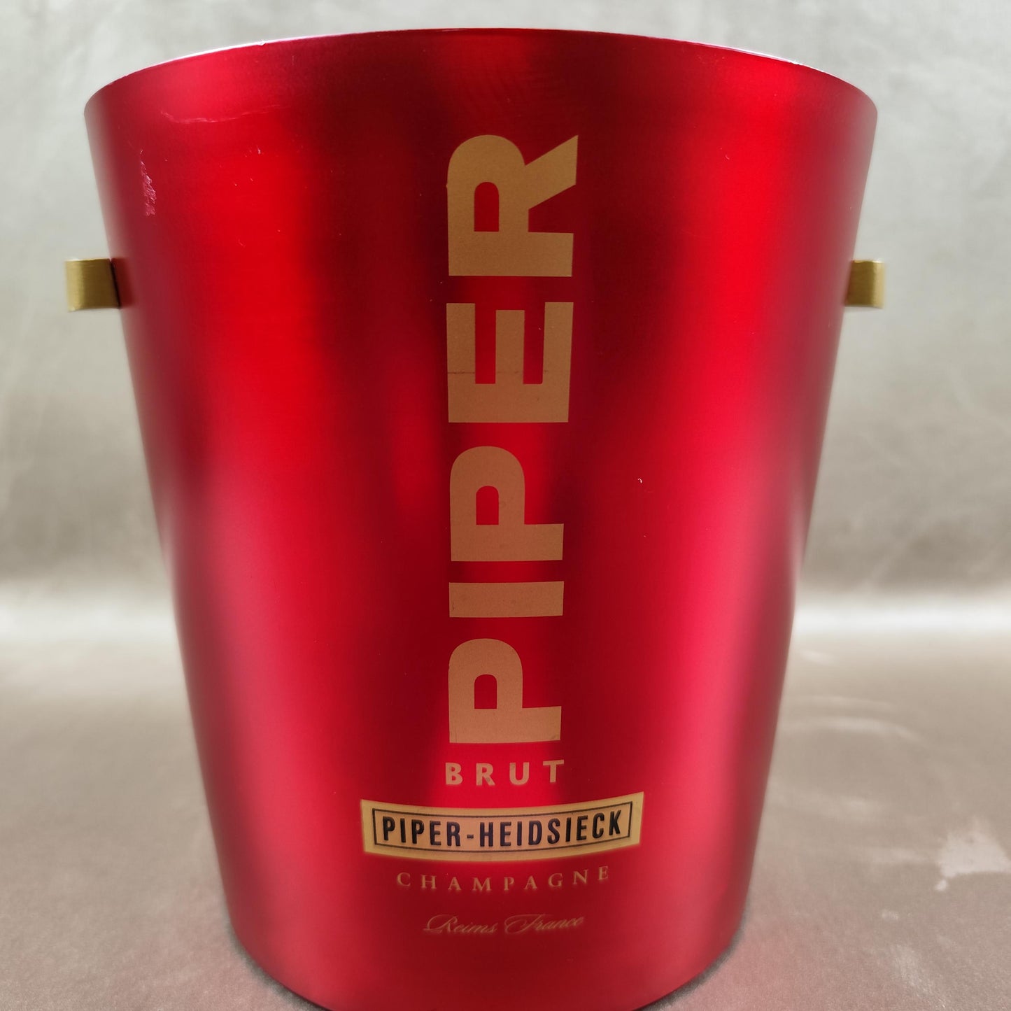 Seau à champagne Piper-Heidsieck en aluminium rouge Publicitaire Brut