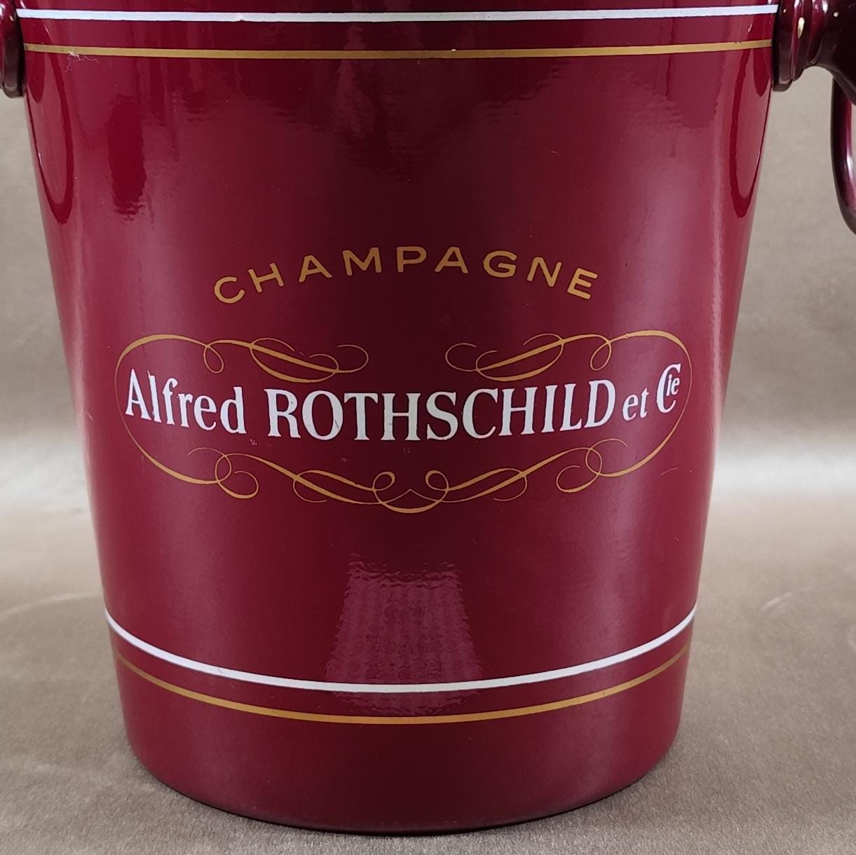 Seau à champagne Alfred Rothschild et Cie en métal laqué rouge Publicitaire Vintage