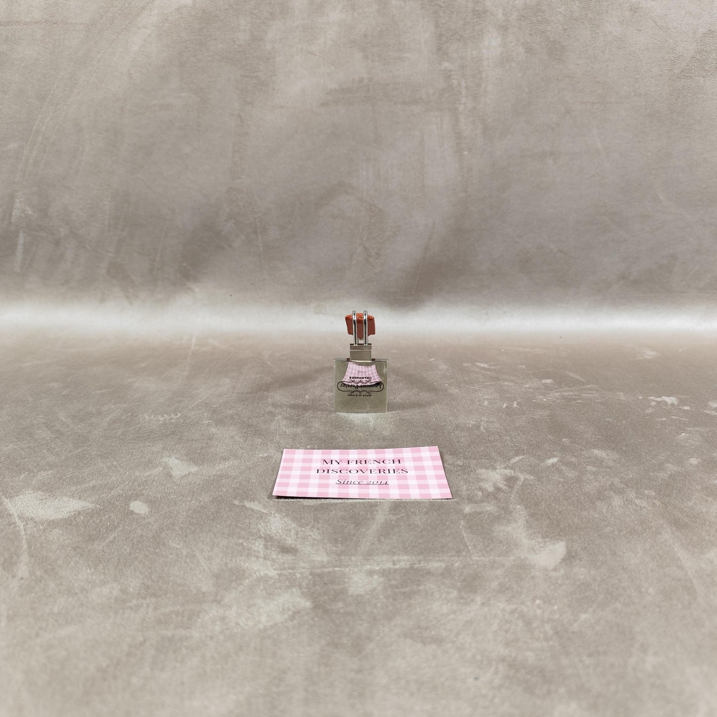 Accroche-sac de table Laurent-Perrier en métal chromé et effet cuir Accessoire publicitaire