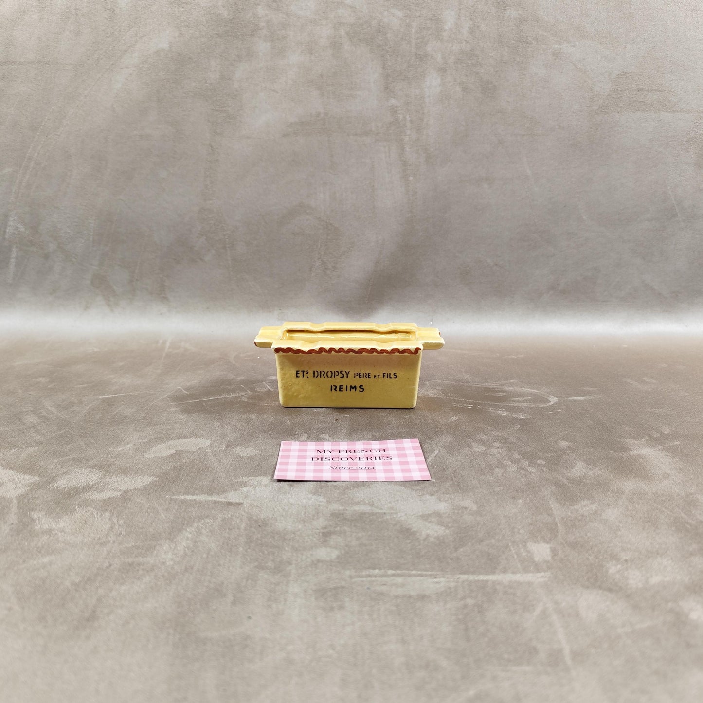 Cendrier publicitaire Dropsy Père et Fils en céramique Forme carton demballage Reims