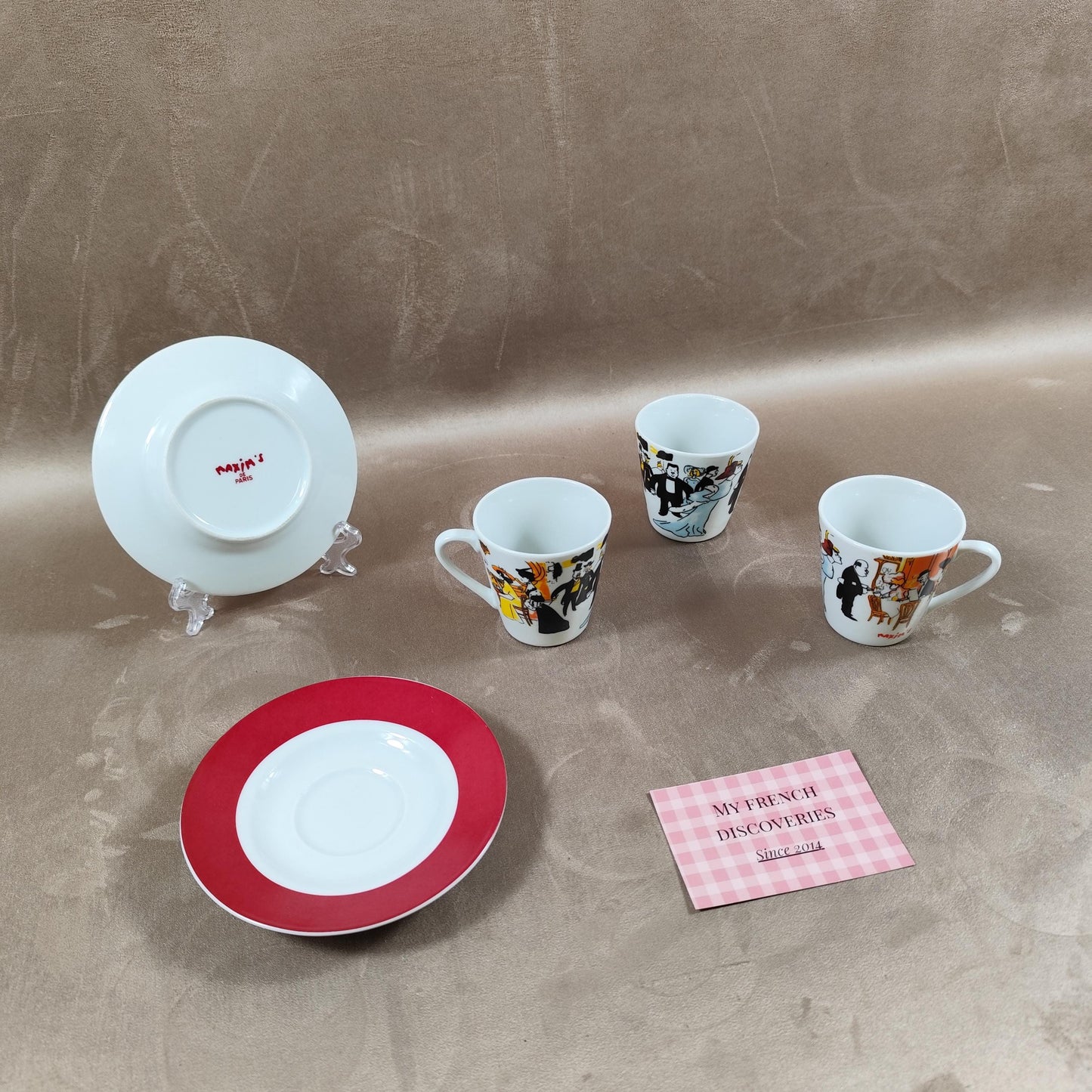 Service à café Maxims Paris en porcelaine Tasses, sous-tasses et sucrier Décor figuratif