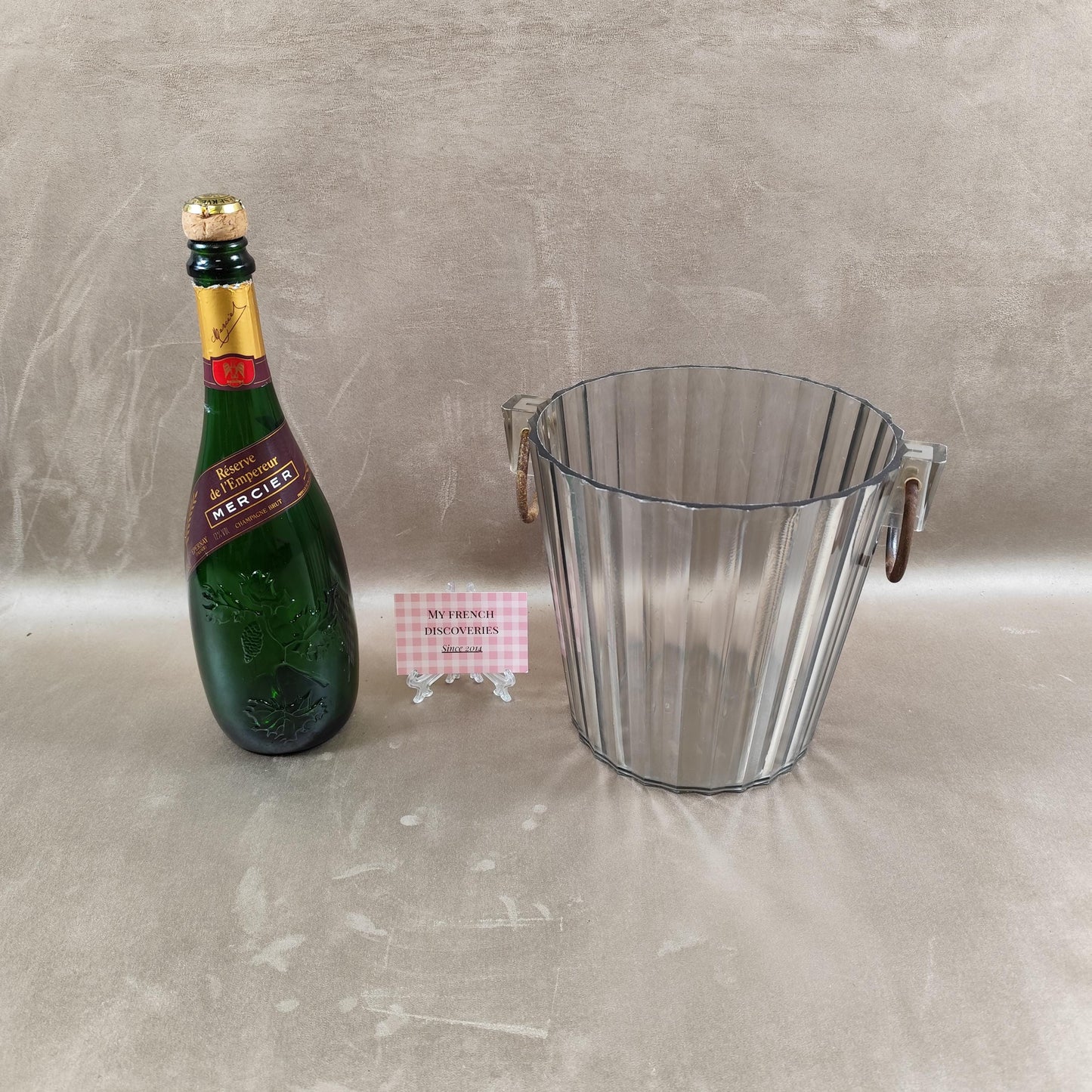 Seau à champagne Mercier en plastique transparent Modèle cannelé Vintage