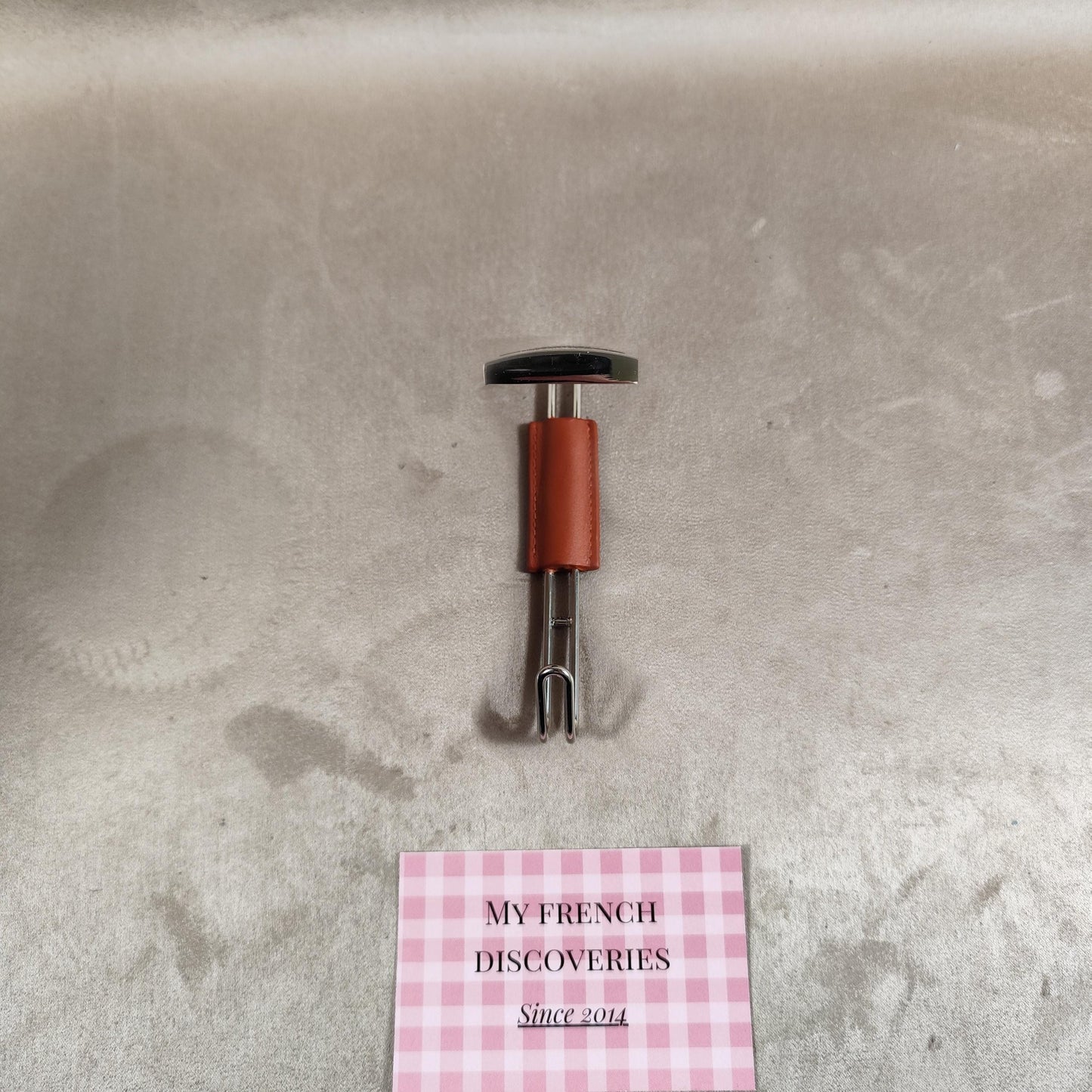 Accroche-sac de table Laurent-Perrier en métal chromé et effet cuir Accessoire publicitaire