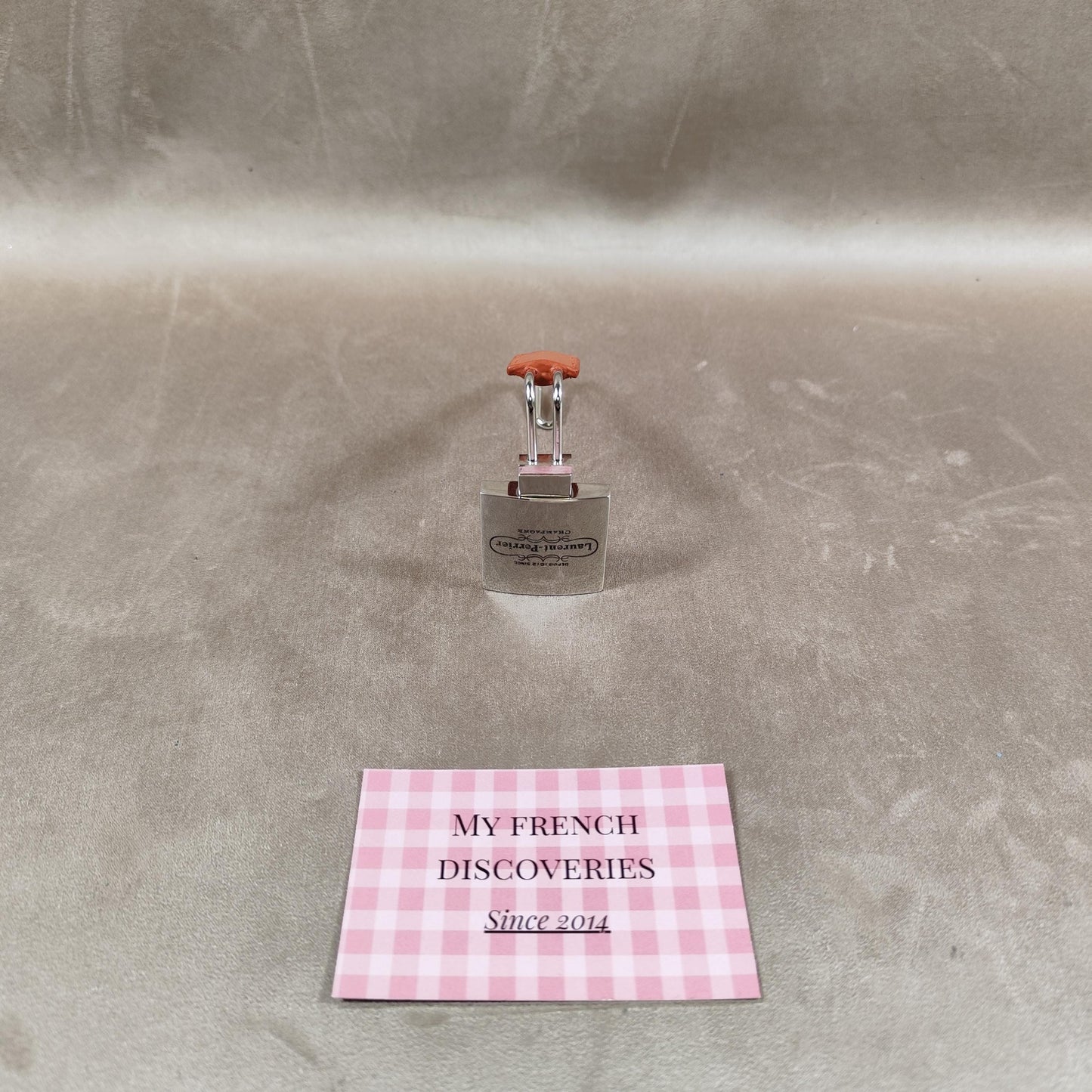 Accroche-sac de table Laurent-Perrier en métal chromé et effet cuir Accessoire publicitaire