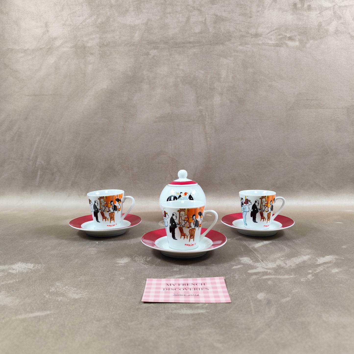 Service à café Maxims Paris en porcelaine Tasses, sous-tasses et sucrier Décor figuratif