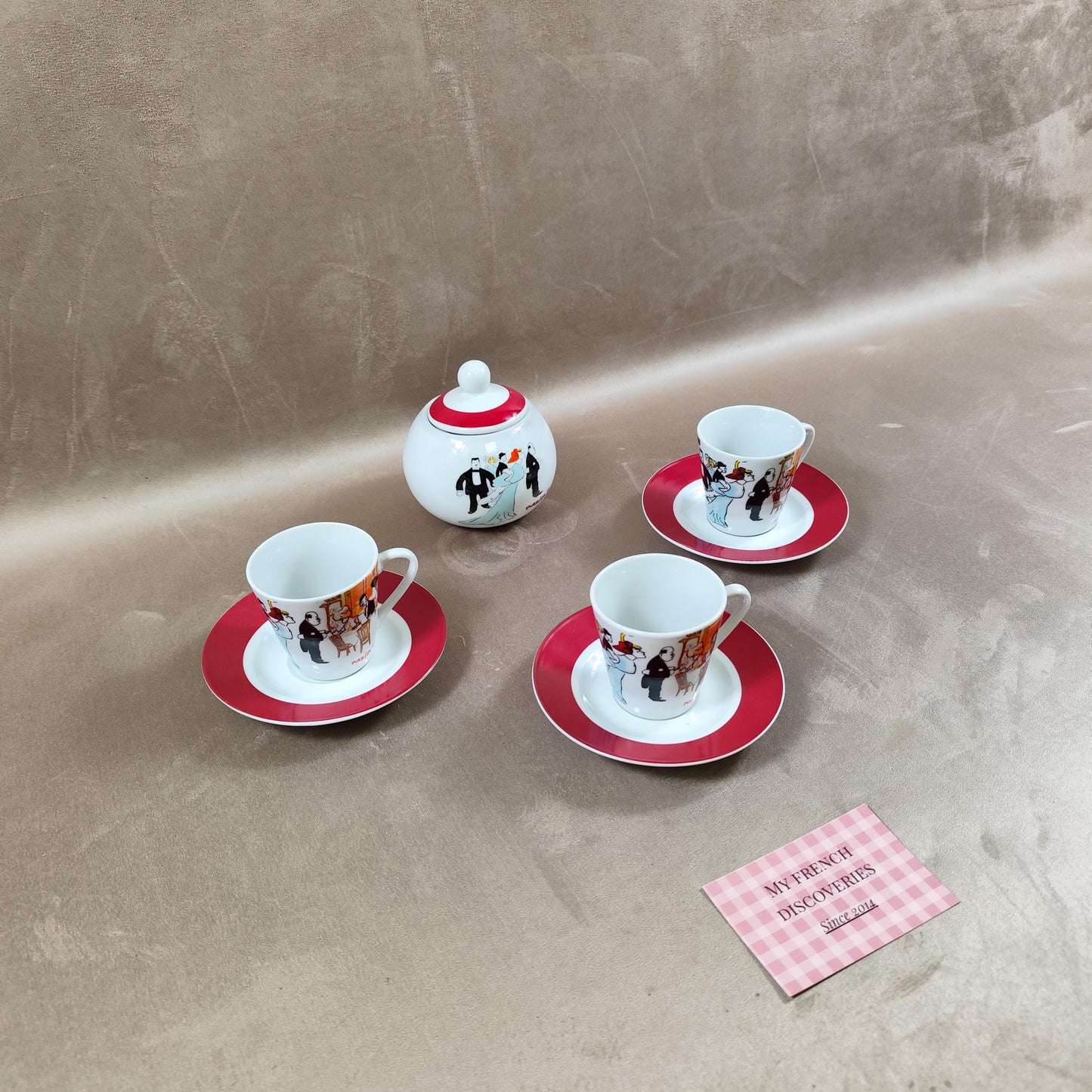 Service à café Maxims Paris en porcelaine Tasses, sous-tasses et sucrier Décor figuratif