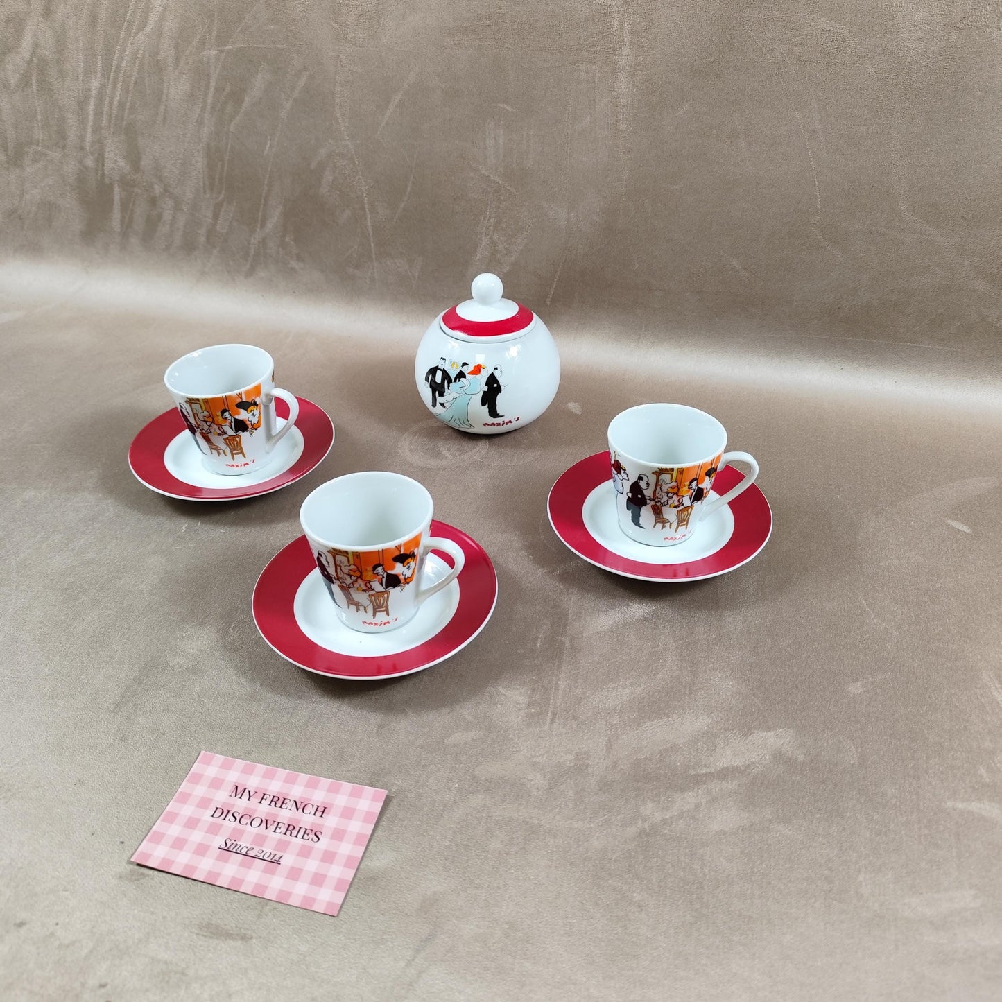 Service à café Maxims Paris en porcelaine Tasses, sous-tasses et sucrier Décor figuratif