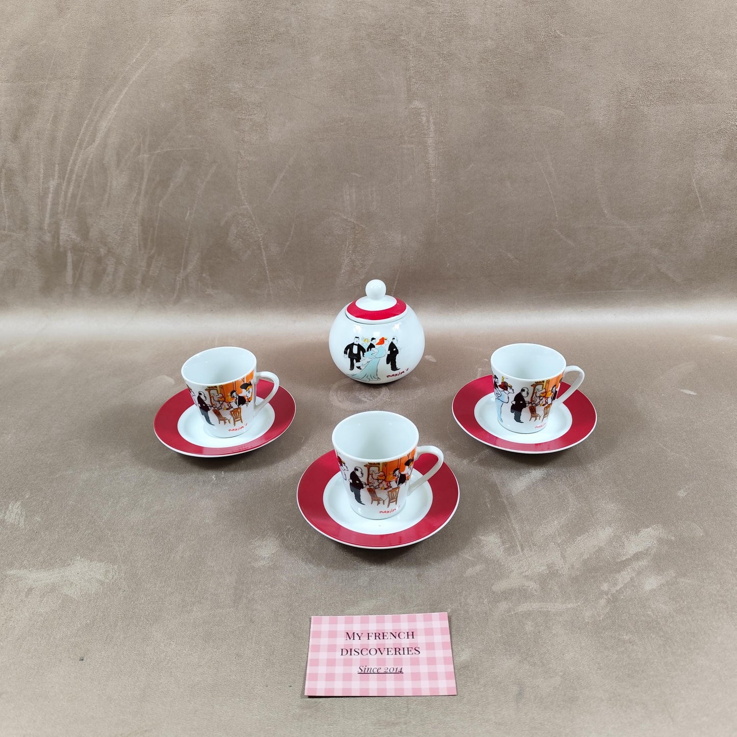 Service à café Maxims Paris en porcelaine Tasses, sous-tasses et sucrier Décor figuratif
