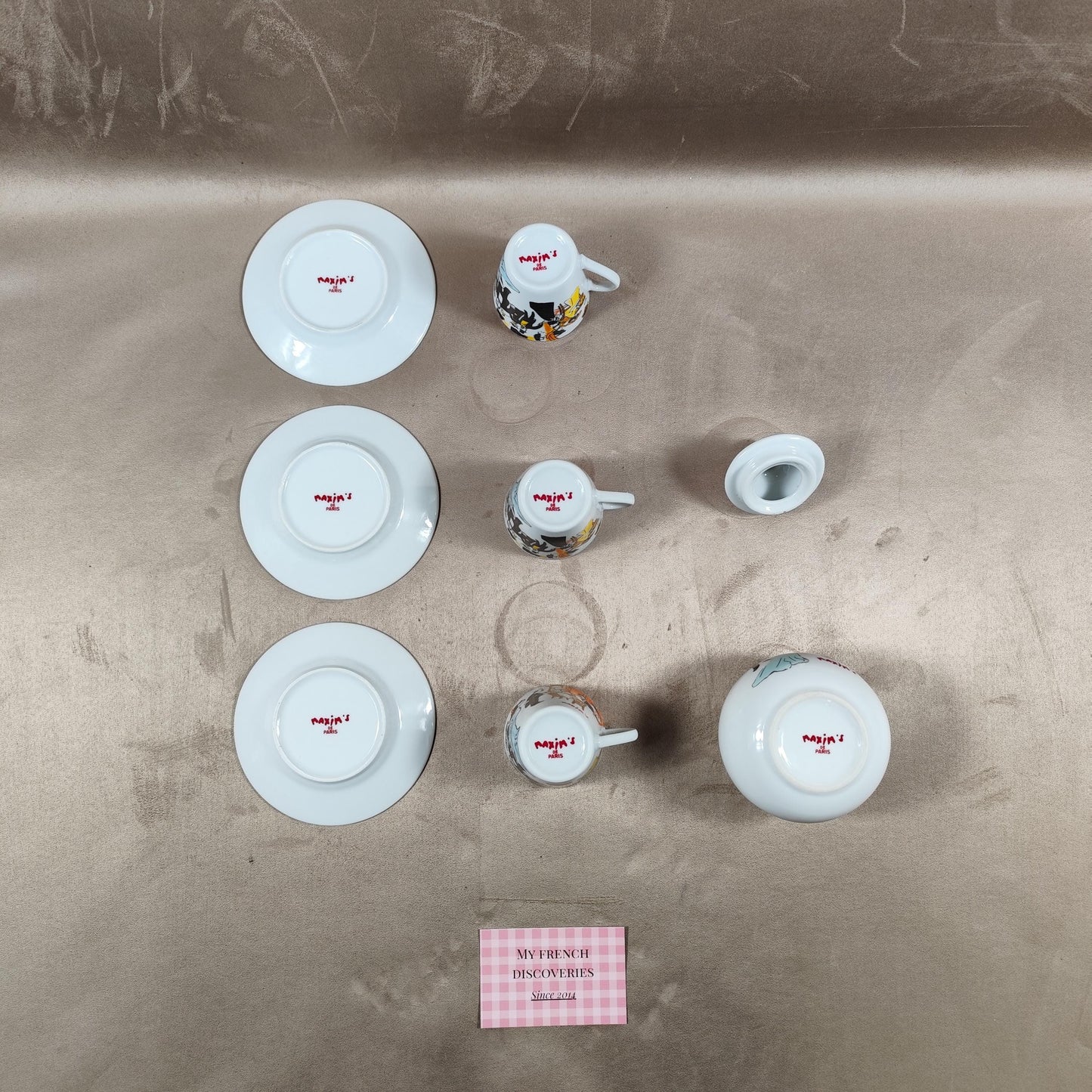 Service à café Maxims Paris en porcelaine Tasses, sous-tasses et sucrier Décor figuratif