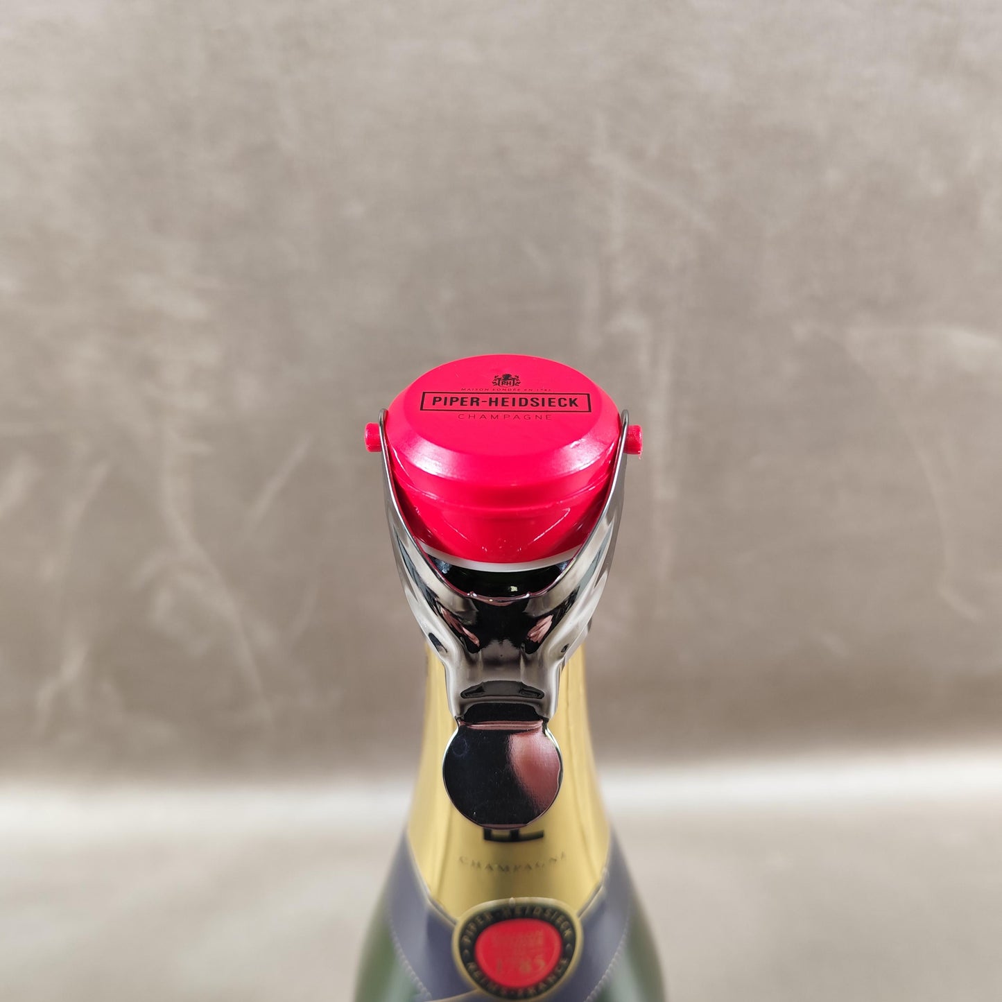 Bouchon stoppeur de champagne Piper-Heidsieck Plastique rouge et métal Accessoire bar