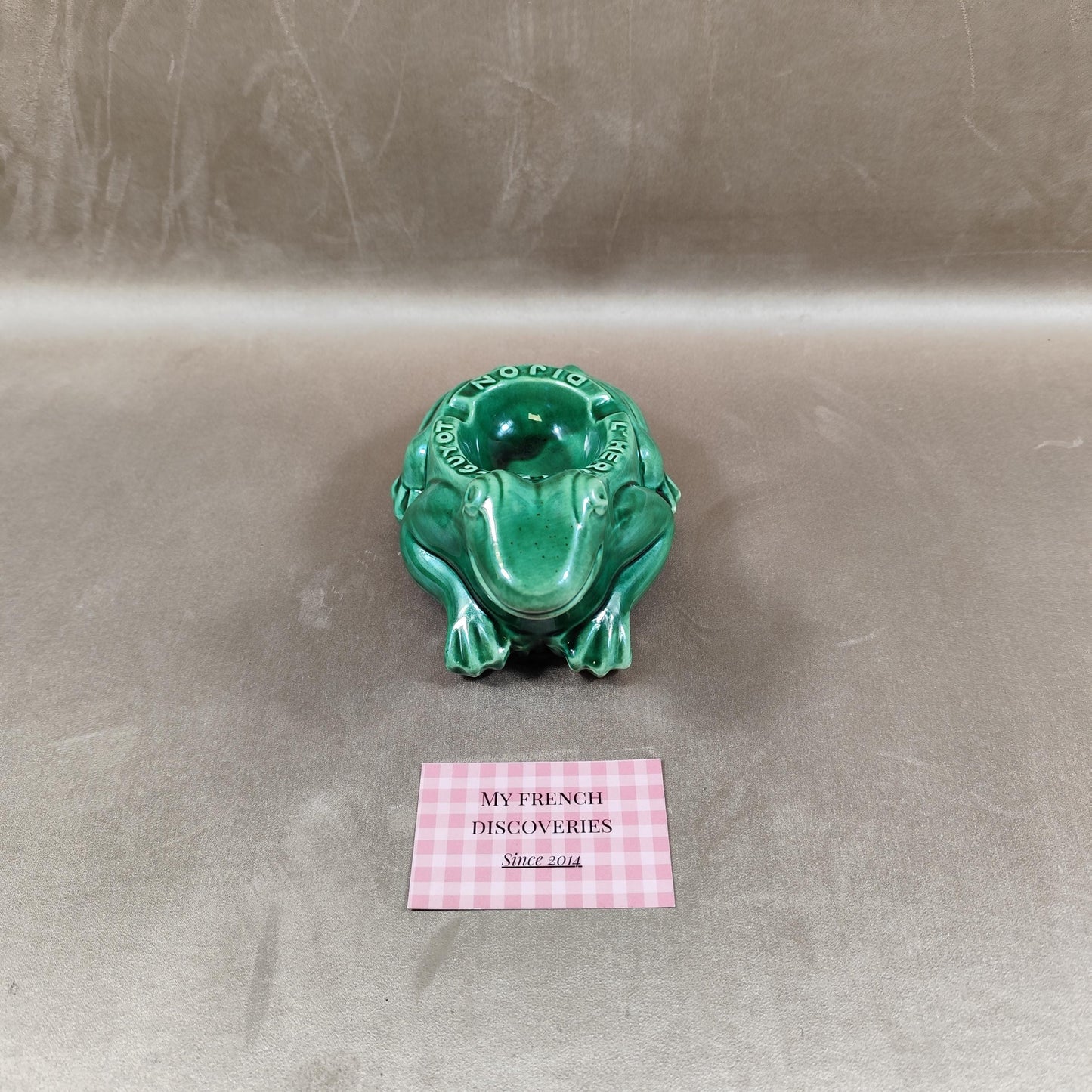 Cendrier publicitaire grenouille LHéritier-Guyot en céramique verte Dijon