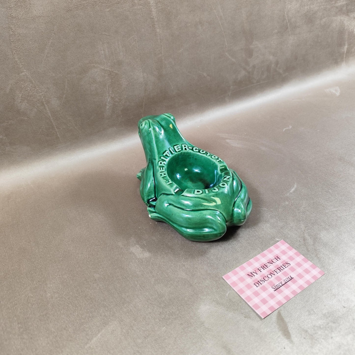 Cendrier publicitaire grenouille LHéritier-Guyot en céramique verte Dijon