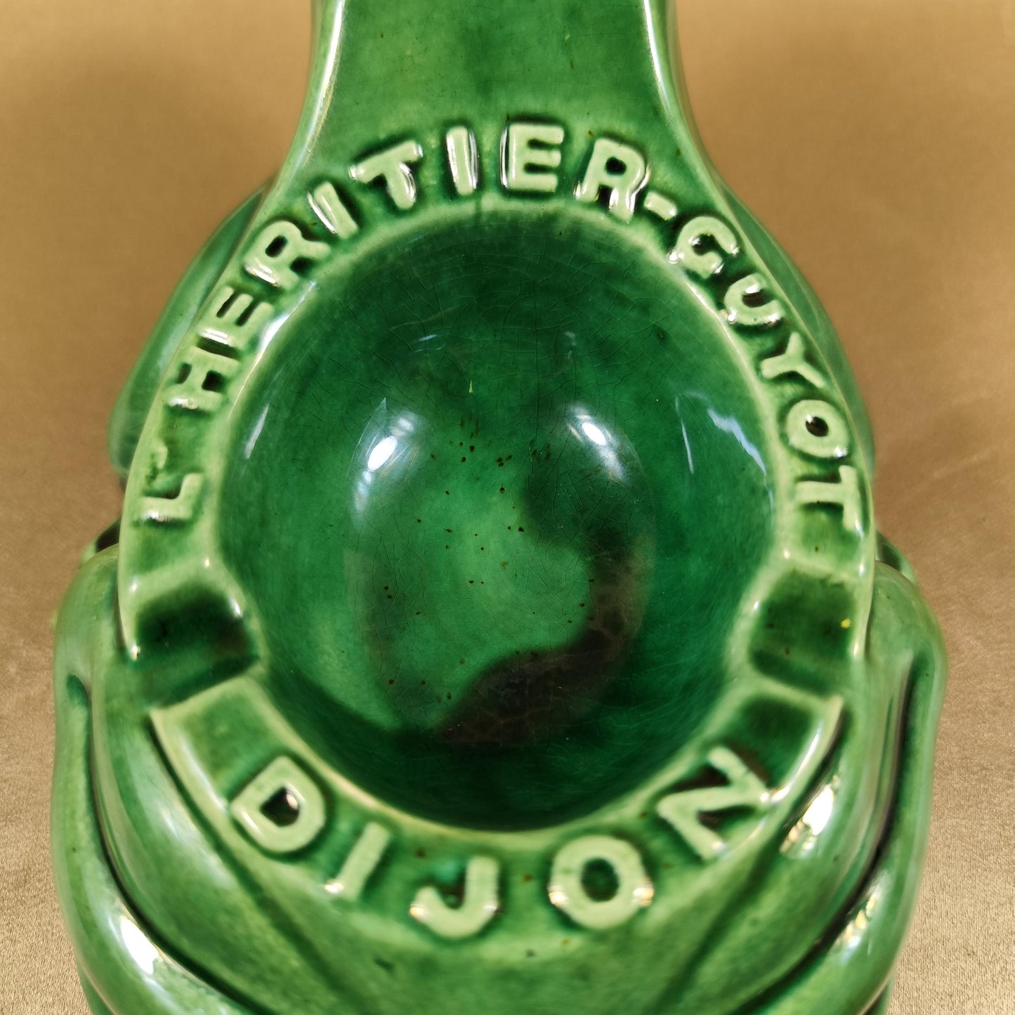 Cendrier publicitaire grenouille LHéritier-Guyot en céramique verte Dijon