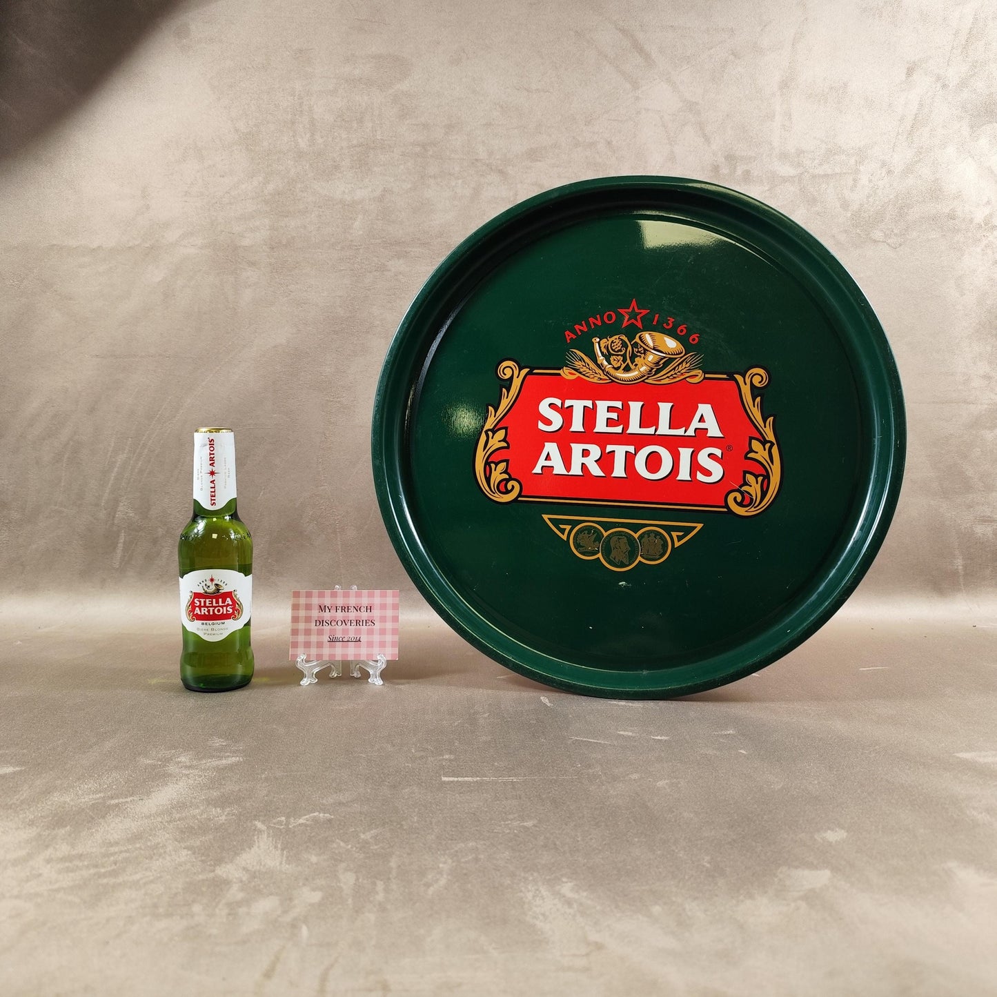 Grand plateau publicitaire Stella Artois Métal vert Anno 1366