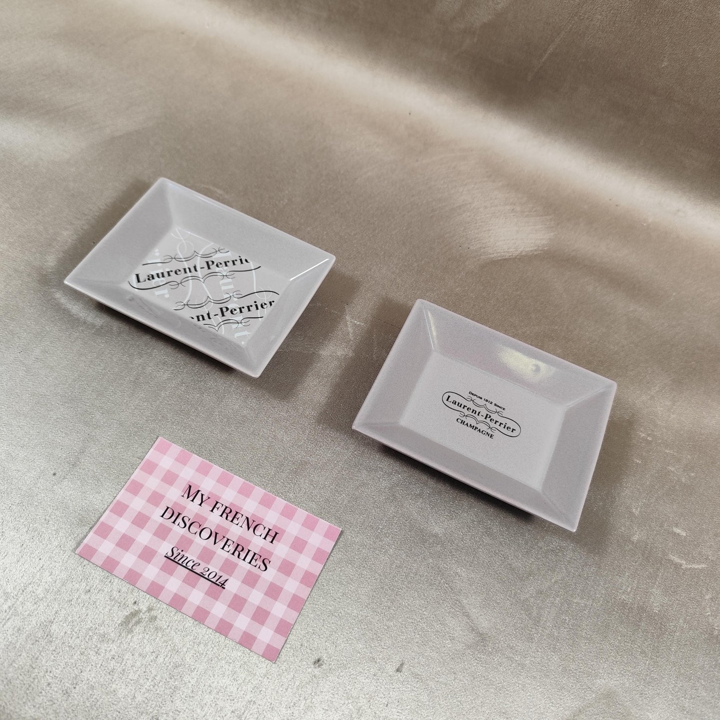 Lot de 2 cendriers publicitaires Laurent-Perrier en porcelaine Champagne Revol