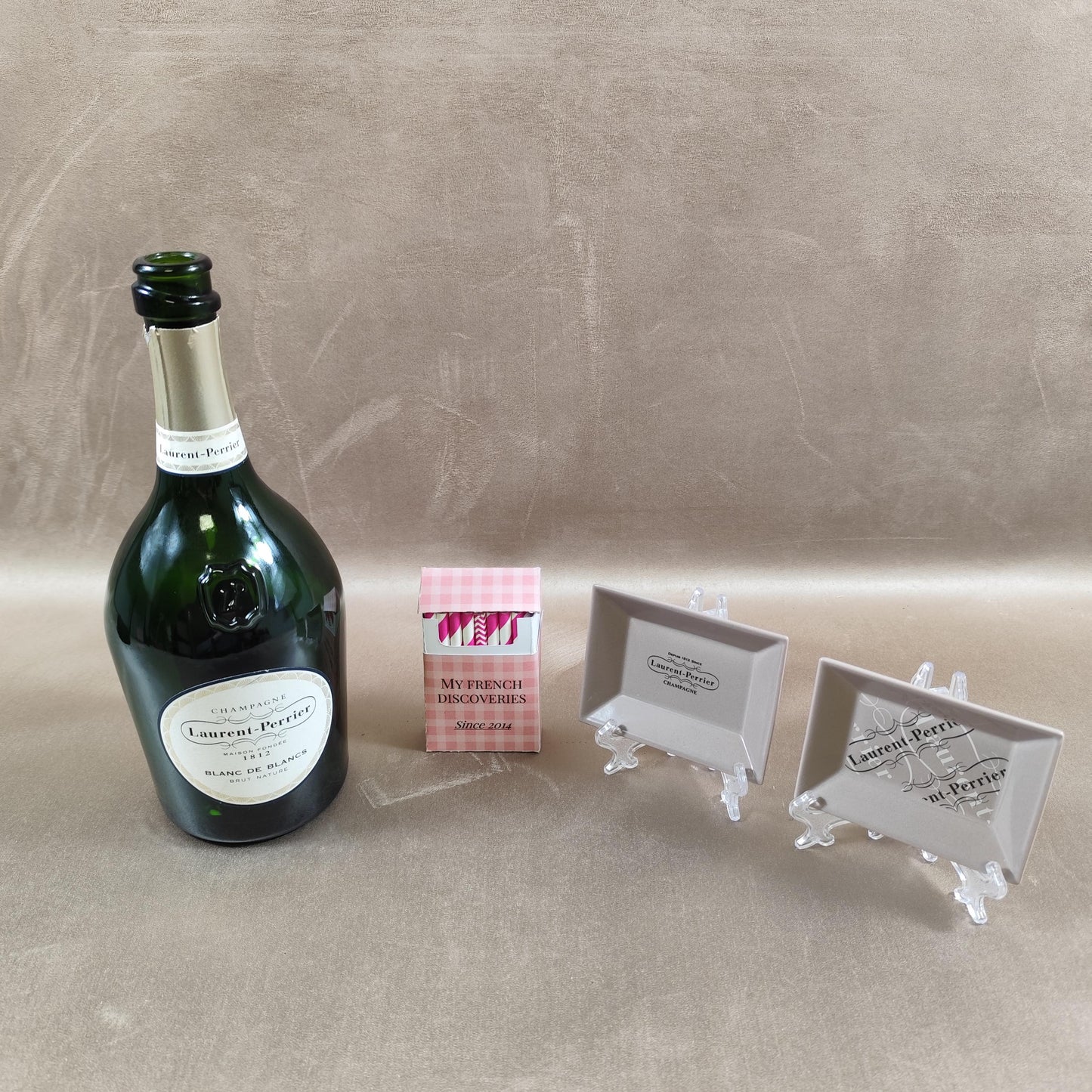 Lot de 2 cendriers publicitaires Laurent-Perrier en porcelaine Champagne Revol