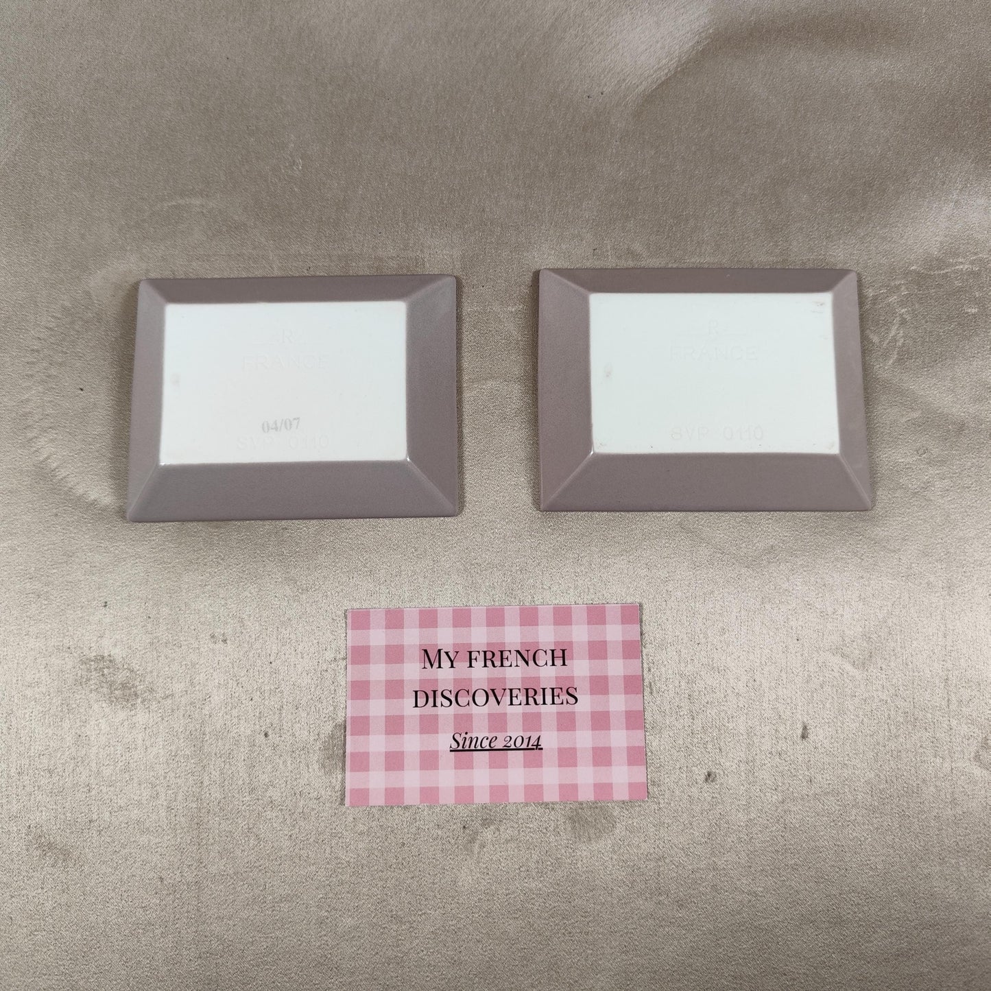 Lot de 2 cendriers publicitaires Laurent-Perrier en porcelaine Champagne Revol