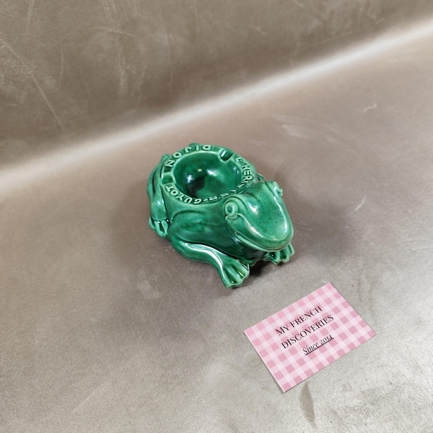 Cendrier publicitaire grenouille LHéritier-Guyot en céramique verte Dijon