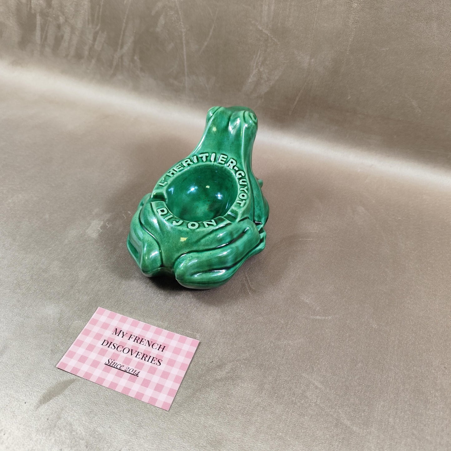 Cendrier publicitaire grenouille LHéritier-Guyot en céramique verte Dijon