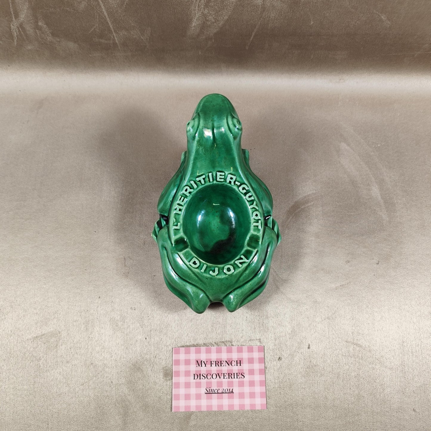 Cendrier publicitaire grenouille LHéritier-Guyot en céramique verte Dijon