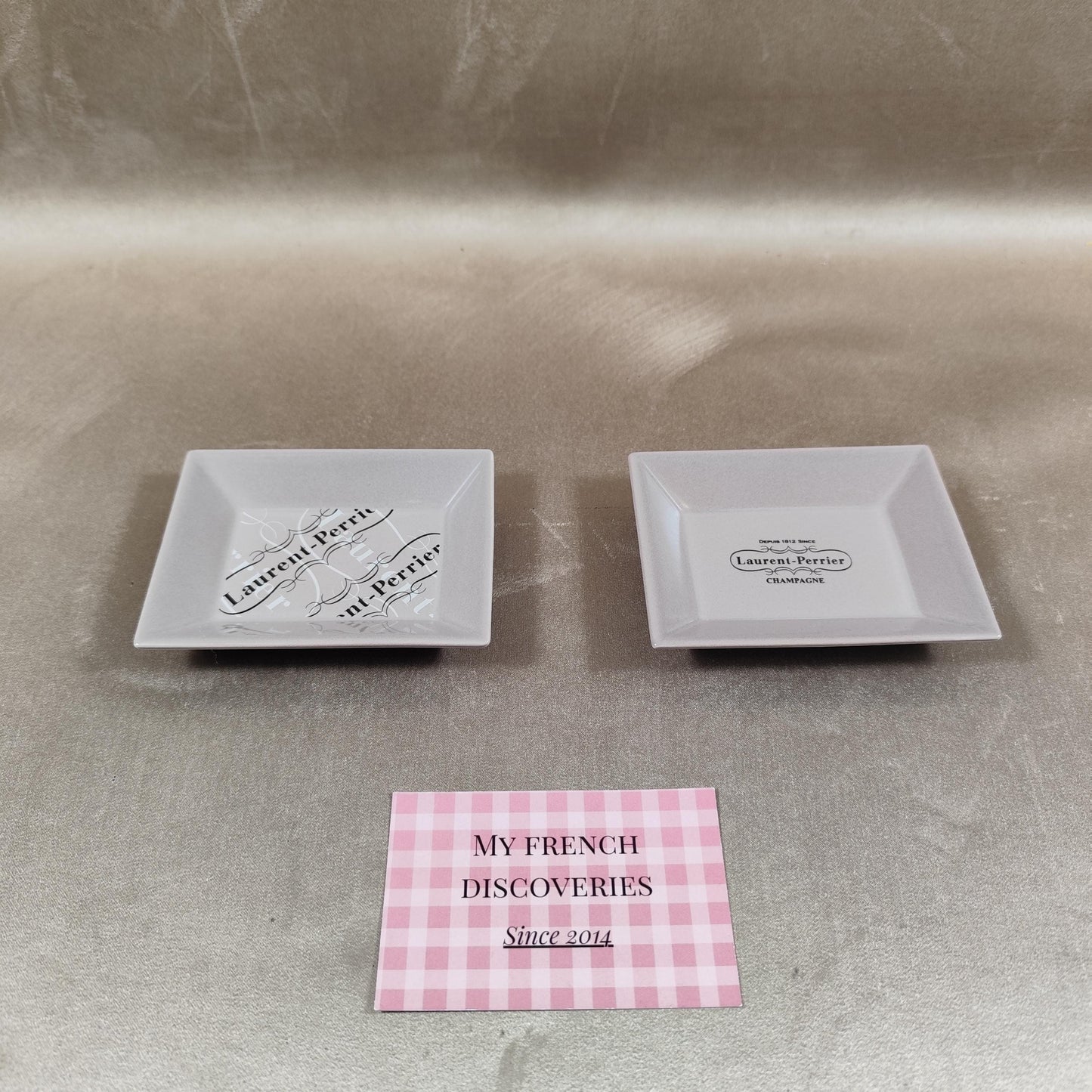 Lot de 2 cendriers publicitaires Laurent-Perrier en porcelaine Champagne Revol